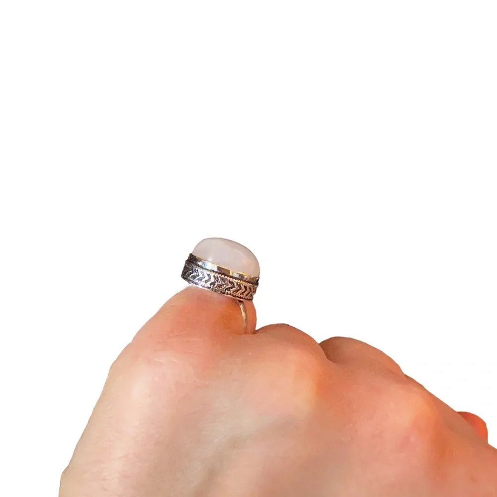 Milky white quartz teardrop stone in sterling silver setting size 6 925